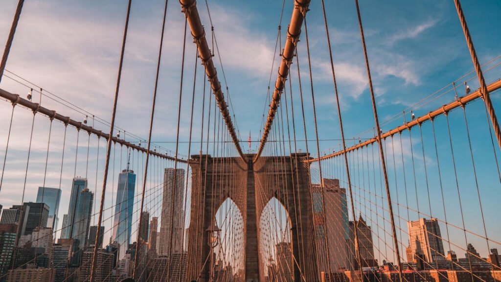 Close-up of Brooklyn Bridge towers and cables showcasing architectural details