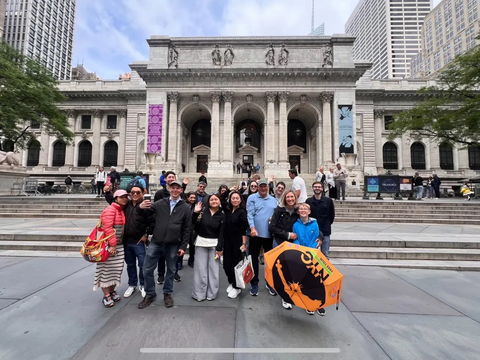 Diverse group of budget travelers participating in NYC Free Tour, highlighting accessibility and inclusivity