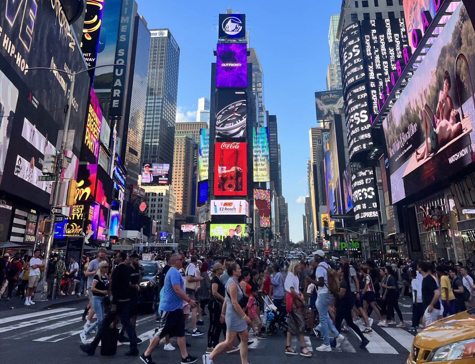 NYC Free Tour group at Times Square, near 49th Street and 7th Avenue, where the Midtown Manhattan walking tour ends