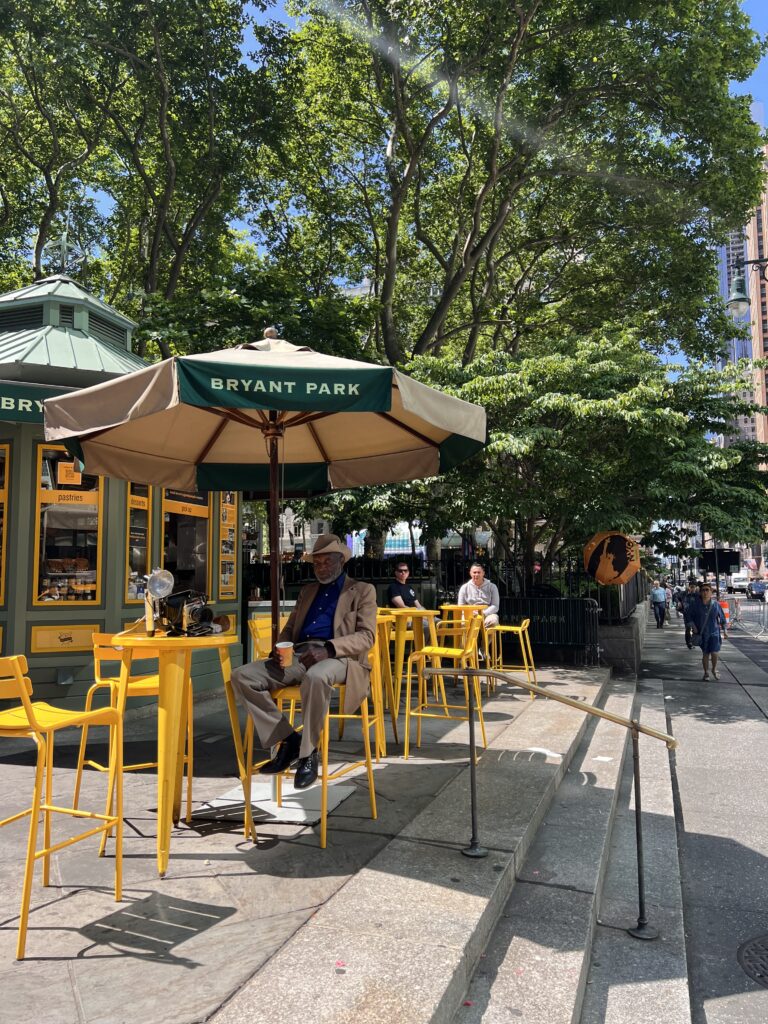 Wafels & Dinges kiosk on the 6th Avenue side of Bryant Park, the NYC Free Tour meeting point at 6th Ave and 42nd St